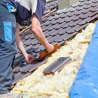 a man working on the roof